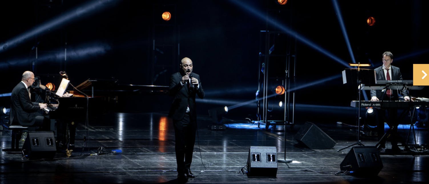 Artist singing on stage